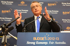 Treasurer Wayne Swan will begin today the job of selling his budget to a sceptical Australia. Photo / Getty Images Treasurer Wayne Swan will begin today the job of selling his budget to a sceptical Australia. Photo / Getty Images