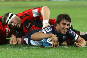 Rebels Nick Phipps scores a try. Photo / Getty Images