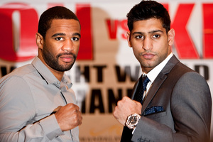 Lamont Peterson, left, of the United States, and British Boxer Amir Khan. Photo / Brynjar Gauti