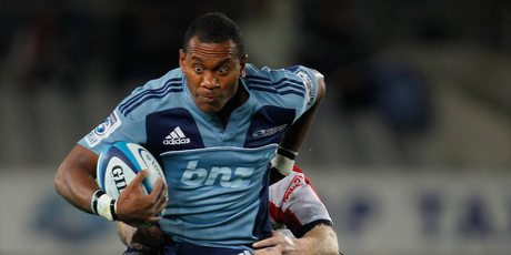Blues David Raikuna drags in the defence during the round 12 Super Rugby match between the Blues and the Lions at Eden Park. Photo / Getty Images.