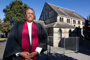 Reverend Ngatokotoru Ine outside the historic Mt Eden Pacific Islanders Presbyterian Church. Photo / Brett Phibbs