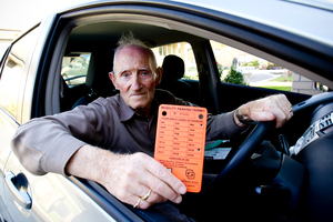 Henry Raynel spent more than an hour in the cold with his car clamped. Photo / Dean Purcell