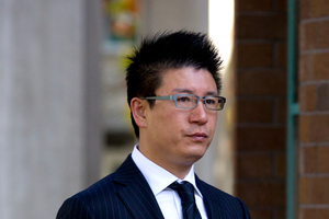Millionaire businessman Yong Ming Yan (aka Yang Liu, aka William Yan) arrives at the Auckland High Court. Photo / Brett Phibbs