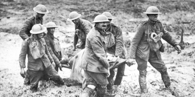 Bringing in the casualties in the first stage of the Third Battle of Ypres. Photo / British Imperial Museum