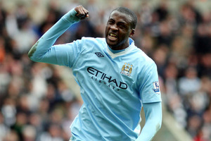 Manchester City's Yaya Toure, celebrates scoring his goal during their English Premier League soccer match against Newcastle United. Photo / Getty Images.