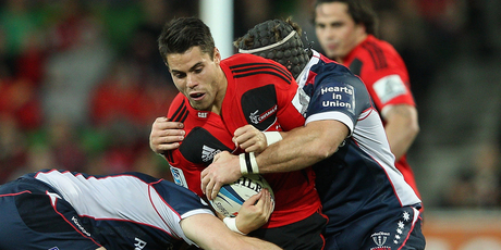 Sean Maitland of the Crusaders is tackled during the round 12 Super Rugby match between the Rebels and the Crusaders. Photo / Getty Images.