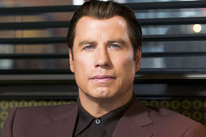 John Travolta says claims he hit on a massage therapist are a lie. Photo / Supplied