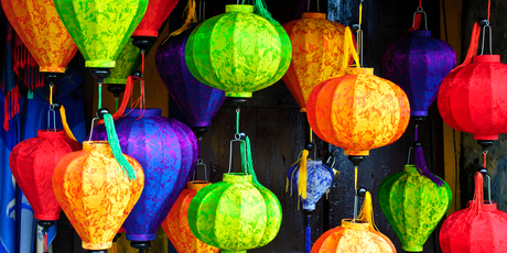 Silk lanterns offer a burst of colour in Hoi An's bustling streets. Photo / Thinkstock