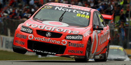 Craig Lowndes tries it on two wheels during last weekend's V8 Supercars round in Perth. Photo / Getty Images