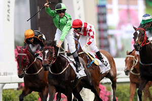James McDonald's career appears headed skyward as he celebrates winning the BMW Champions Mile at Sha Tin on Sunday. Photo / Hong Kong Jockey Club