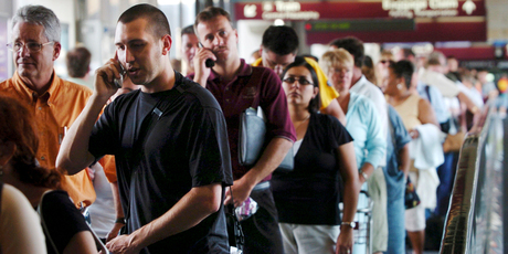 Queuing at airports is the most frustrating part of the travel experience for many people. Photo / Bloomberg News
