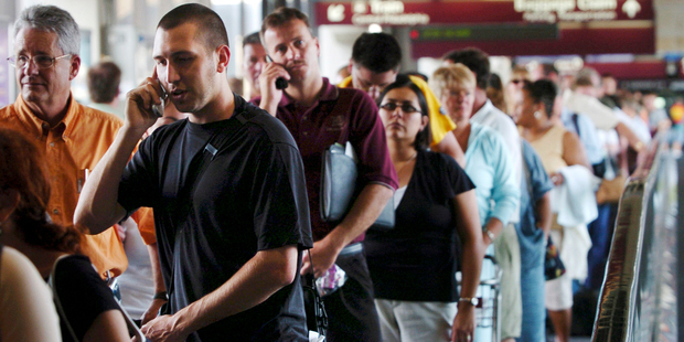 Queuing at airports is the most frustrating part of the travel experience for many people. Photo / Bloomberg News