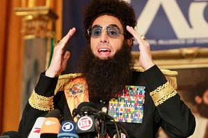 Sacha Baron Cohen has apologised for covering Ryan Seacrest in the 'ashes' of Kim Jong-Il. Photo / AP