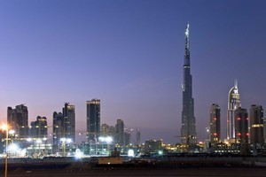 One bank has drawn a link between a skyscraper building boom and impending economic collapse. Photo - the Dubai skyline with the world's tallest building, the 828m Burj Khalifa shown. Photo / Thinkstock