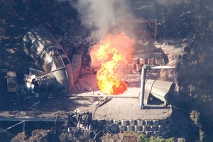 Flames burst from the Pike River Mine. File photo / Mark Mitchell
