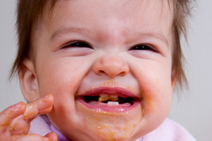 The age that babies are at their ickiest, they're also at their cutest.
Photo / Thinkstock
