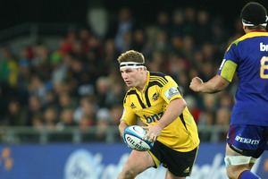 Brad Shields gets a run for the Hurricanes against the Brumbies, giving Beauden Barrett a rest. Photo / Getty Images