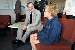 John Key met Sam Willems at his Christchurch school and comforted him over the loss of his mother, Lisa, in the earthquake. Photo / Getty Images
