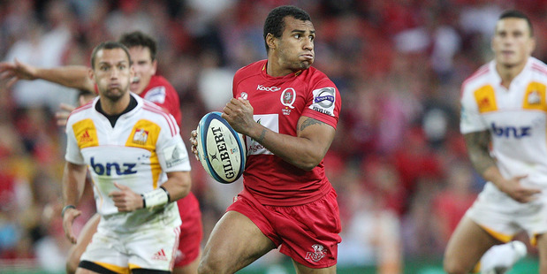Will Genia of the Reds makes a break to score a try during the round 12 Super Rugby match between the Reds and the Chiefs. Photo / Getty Images.