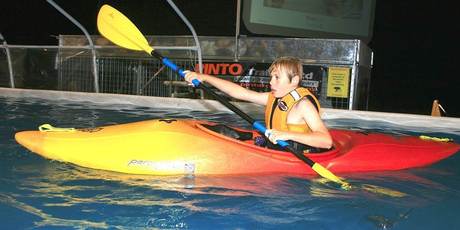 Safely lifejacketed, kids can try their hand at paddling a kayak. Photo / Supplied