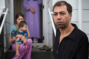 Mohammad naim Mohammed, his partner Tiana Kausari , their son Eshan and Mr Mohammed's mother, Miriam, must also replace food they had only just bought. Photo / Greg Bowker