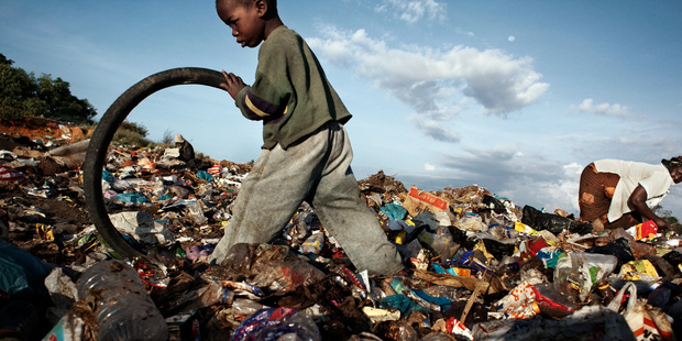 Millions suffer poverty and malnutrition under Robert Mugabe's regime in Zimbabwe, while their leaders fly around the world in chartered planes for shopping trips. Photo / Robin Hammond