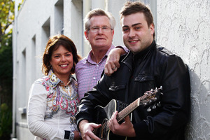 Tim Walker, right, with parents Sir John and Helen Walker. Photo / Doug Sherring