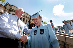 Columbia University janitor Gac Filipaj at graduation. Photo / AP