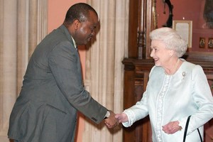 King Mswati III of Swaziland is greeted by Queen Elizabeth II. Photo / AP