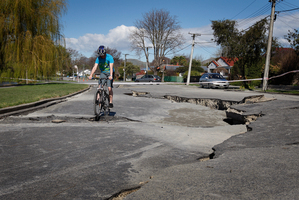 Severely damaged road in Christchurch. Photo / Sarah Ivey