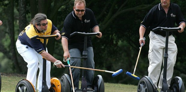 Steve Wozniak (L) in his 2006 Segway Polo tournament. He is playing against NZ tech entrepreneur Rod Drury (C) and Rodney Prescott. Photo / Brett Phibbs