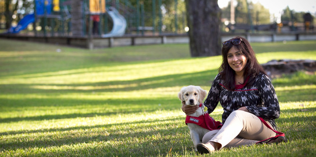 Sudeepta with guide dog puppy Quinn. Photo / Natalie Slade