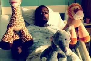 50 Cent tweeted this photo of himself purportedly recovering in hospital from a stomach virus. Photo / Twitter