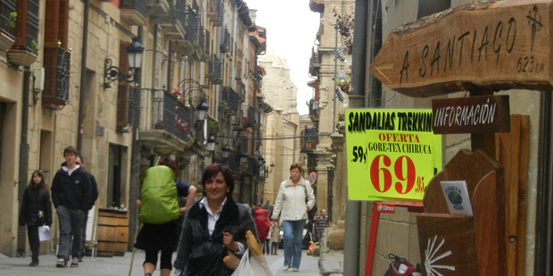 A shop sign in Viana points the way to journey's end at Santiago. Photo / Simon Winter