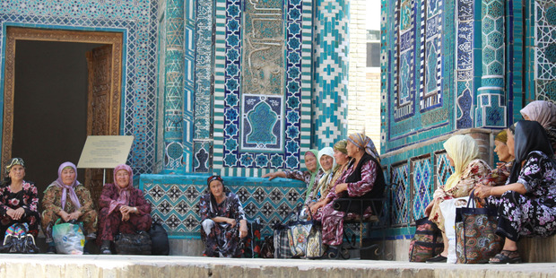 Pilgrims at Shahr-i-Zindah or the Tomb of the Living King, in Samarkand, Uzbekistan. Photo / Jim Eagles