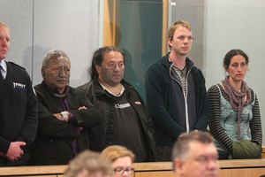 Tame Iti, Te Rangikaiwhiria Kemara, Urs Signer and Emily Bailey at the sentencing yesterday.