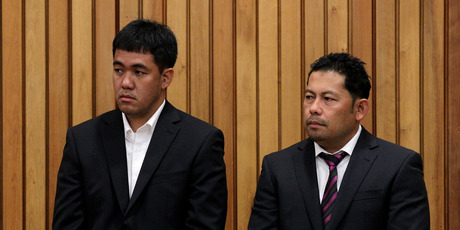 Navigation officer Leonil Relon (left) and captain Mauro Balomaga in court yesterday for sentencing over their role in the disaster that left the Rena grounded and shattered off Tauranga. Photo / Alan Gibson