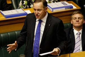 Prime Minister John Key responding to Labour's attack after the reading of the 2012 Budget in the House. Photo / Mark Mitchell
