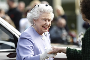 The Queen stays cool, keeping her clothes pressed.
Photo / AP