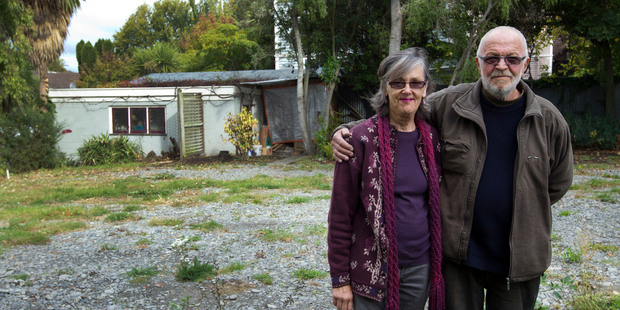 Bill and Kathy Lawrence on their empty section in central Christchurch. Photo / Simon Baker