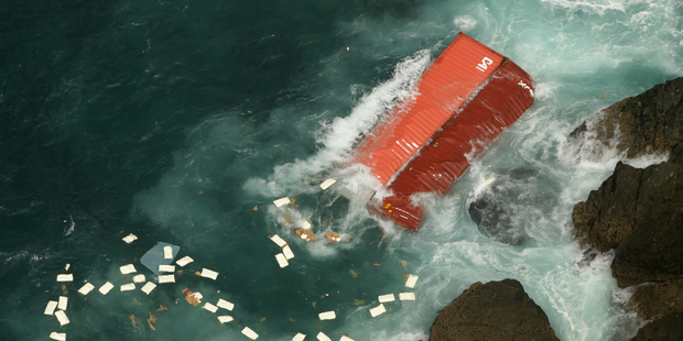 The Rena ran aground on October 5 last year. Photo / Alan Gibson