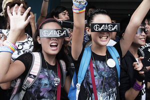 Lady Gaga fans wait for the pop star to perform in Manila. Photo / AP
