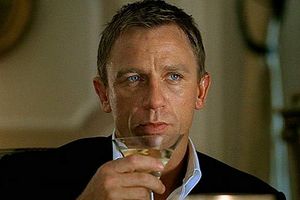 Daniel Craig's James Bond enjoys a martini. Photo / Supplied
