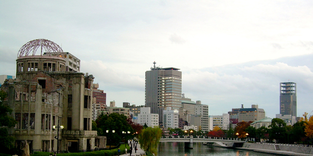 The Atomic Dome in Hiroshima (left), the nearest building to the blast zone, survived the atomic bomb attack in 1945. Photo / Creative Commons image by Wikimedia user Hirotsugu Mori