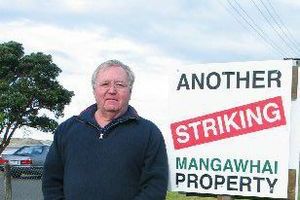 Bruce Rogan and other ratepayers have put up strike signs, and want the Kaipara District Council declared insolvent. Photo / Northern Advocate