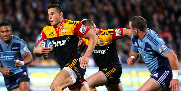 Chiefs' Sonny Bill Williams makes a break during the Super Rugby match between the Blues and Chiefs at North Harbour Stadium. Photo / Anthony Au-Yeung.