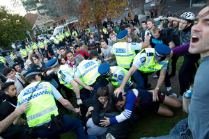 Police and students clash at the University of Auckland yesterday after the protest got out of control. Photo / Richard Robinson