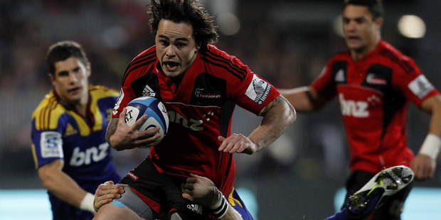 Crusaders' winger Zac Guildford on the way to scoring one of his two tries last night. Photo / Getty Images.