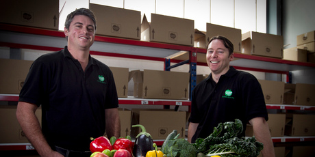 Joshua Bartley-Smith (left) and Jason Brennan with typical produce from their online fruit and vegetable delivery business. Photo / Natalie Slade