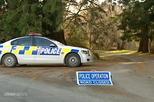 Police have set up a wide cordon around the homicide scene. Photo / One News